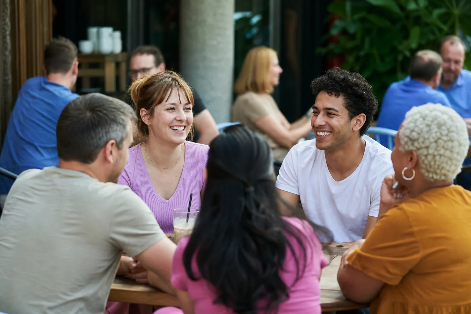 Single adults chatting at a relaxed social event in York